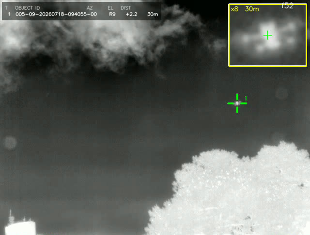 GOTEAM thermal detection of a small distant drone against the night sky, crosshair-locked with a zoom inset confirming the quadcopter.